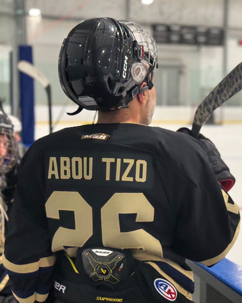 The back of a Blackout jersey with a custom name and number 26