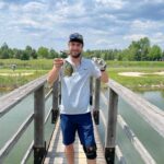 Jake showing his caught fish while fishing at MSH Annual Charity Golf Tournament at Turtle Creek Friday June 2nd 2023